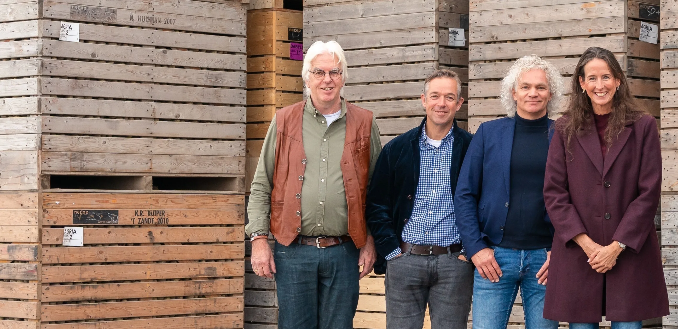 Vier agroconsulenten op een rij